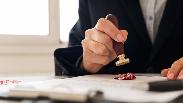 Notary public verifying and stamping documents for notary services in Hollywood, FL